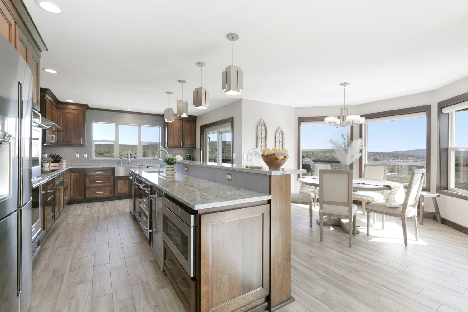 mal-and-joel-real-estate-yakima-wa-renovating-before-listing-kitchen-with-warm-brown-cabinetry-with-elegant-breakfast-nook