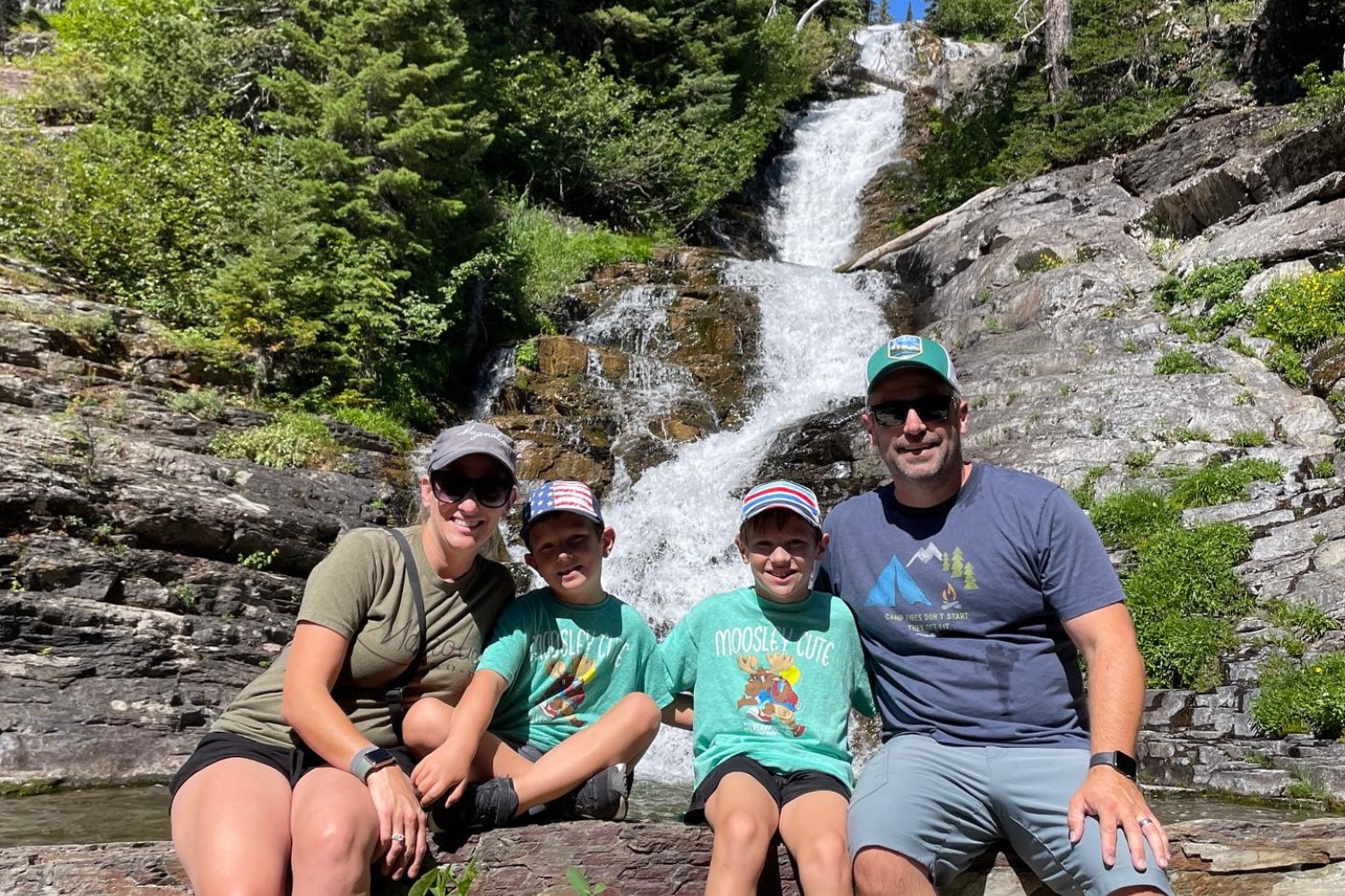 mal-and-joel-real-estate-yakima-wa-hiking-familiy-at-waterfall